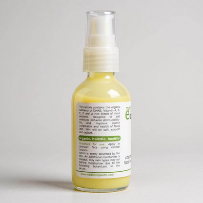 Made from Earth Vitamin Enhanced Face Firming Serum with DMAE, Vitamins A, B, C, E, and alpha lipoic acid. Yellow serum in a pump bottle.